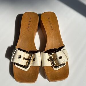 Marni wooden platforms with white leather and gold buckle